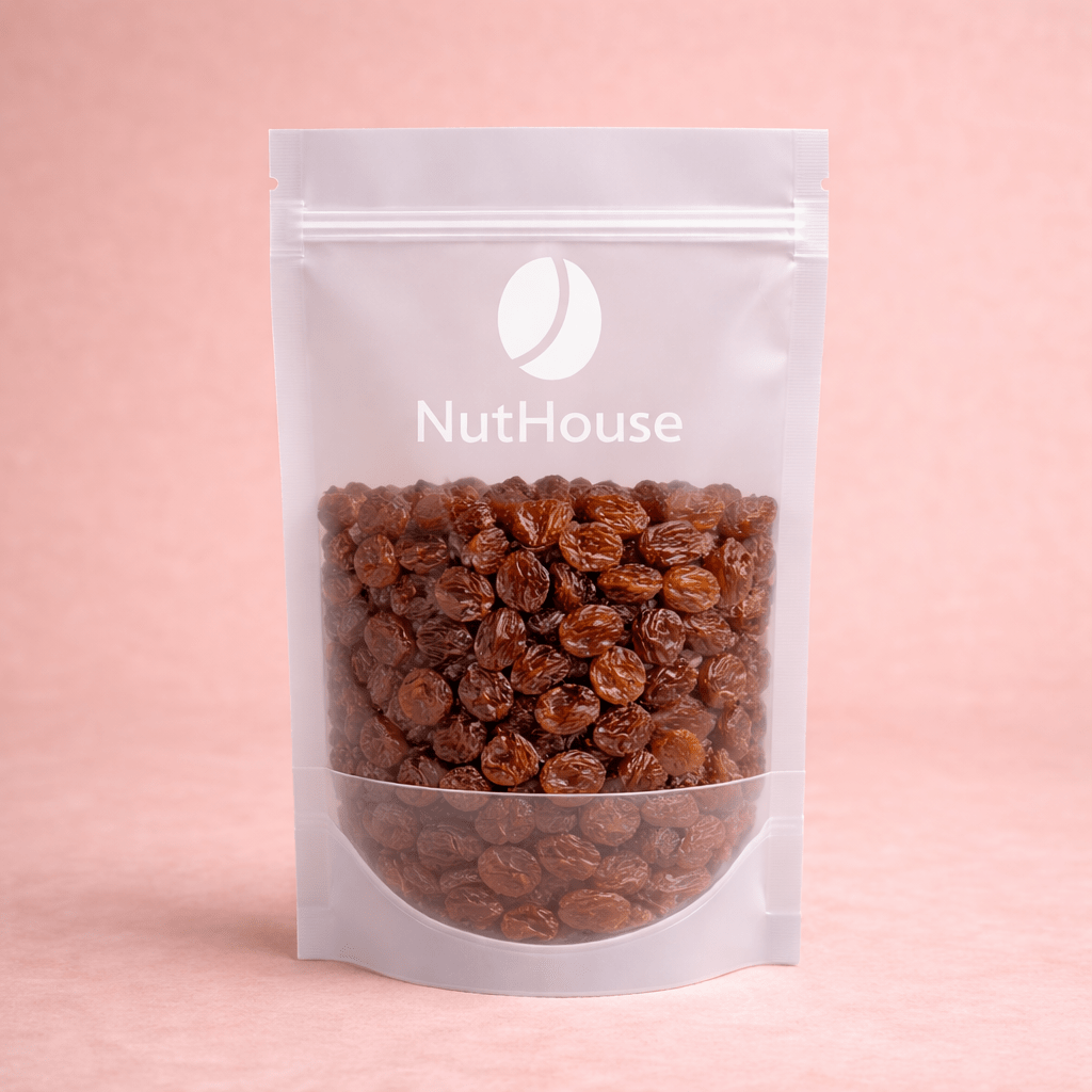 Nut House brown raisins in resealable pouch with window showing plump deep amber dried grapes