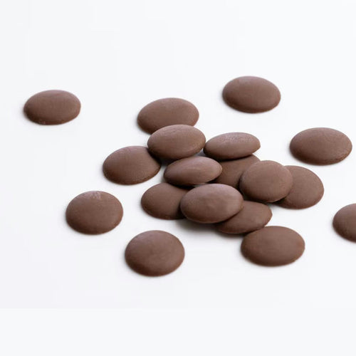 Cacao Barry Papouasie 35% milk chocolate couverture discs with earthy woody texture