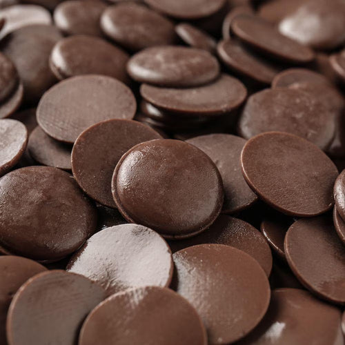Close-up of chocolate buttons with a brown color.