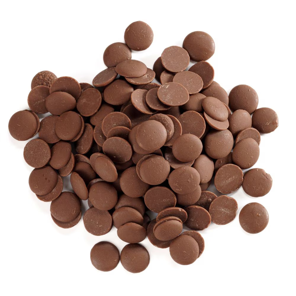 Pile of chocolate chips on a white background