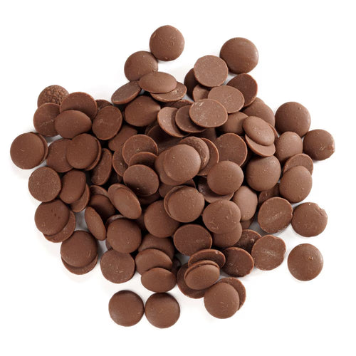 Pile of chocolate chips on a white background