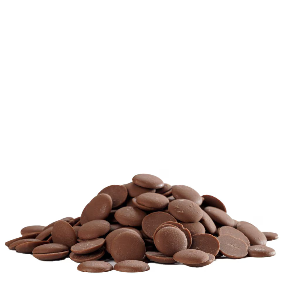 Stack of chocolate buttons on a white background