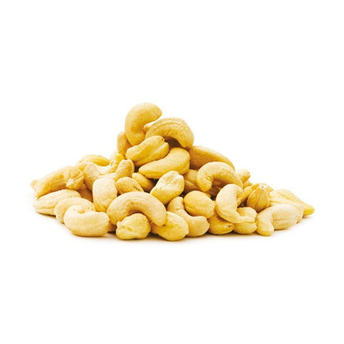 Loose mound of creamy beige whole kidney-shaped raw cashews on white background