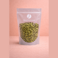 Nut House green cardamom pods in clear resealable pouch with olive-green ridged spice