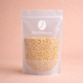 Nut House ground hazelnuts in resealable pouch showing fine golden-beige texture for baking