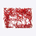 Nut House premium Iranian saffron threads with deep crimson color and golden tips