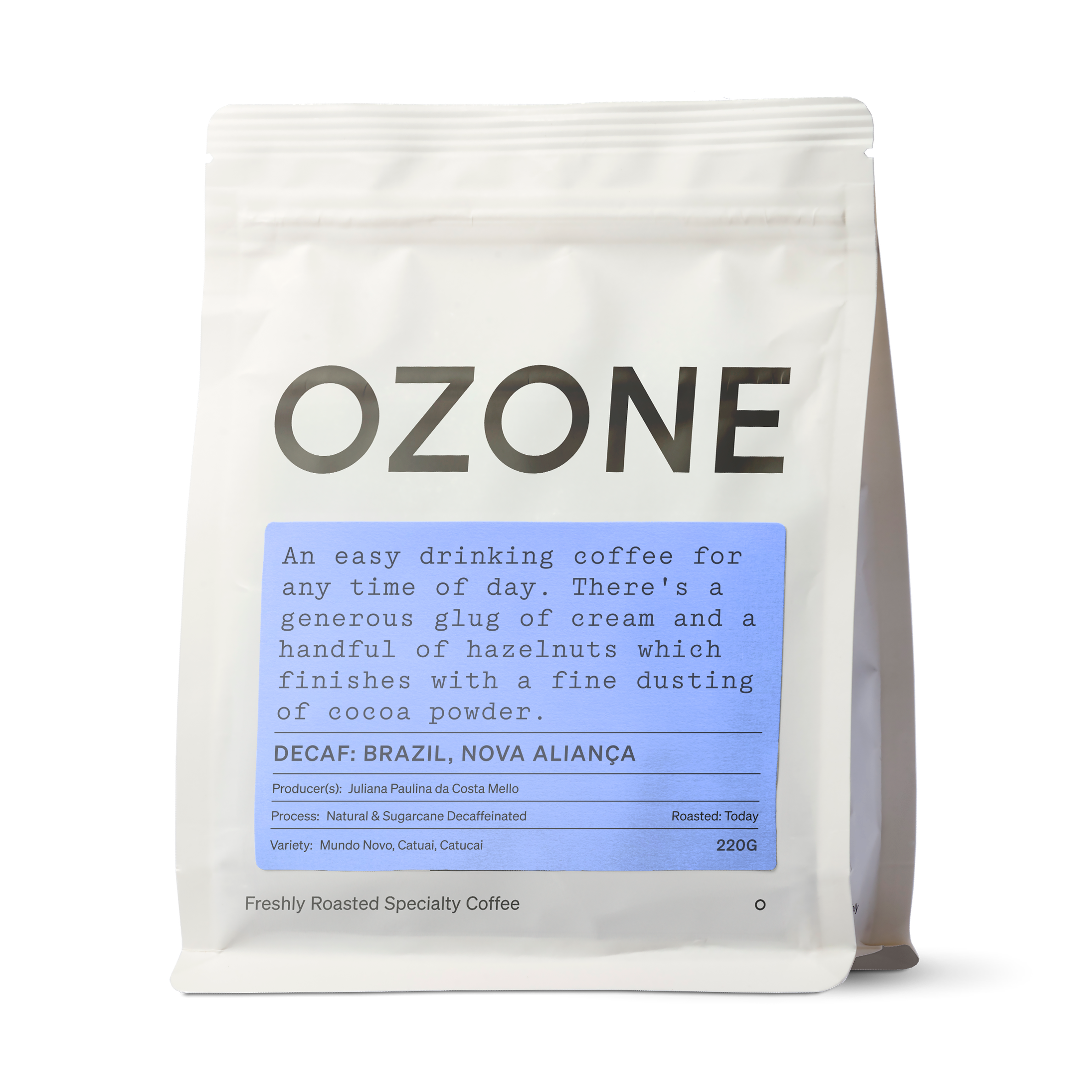 Ozone Decaf Brazil coffee bag with light blue label showing hazelnut and cocoa notes