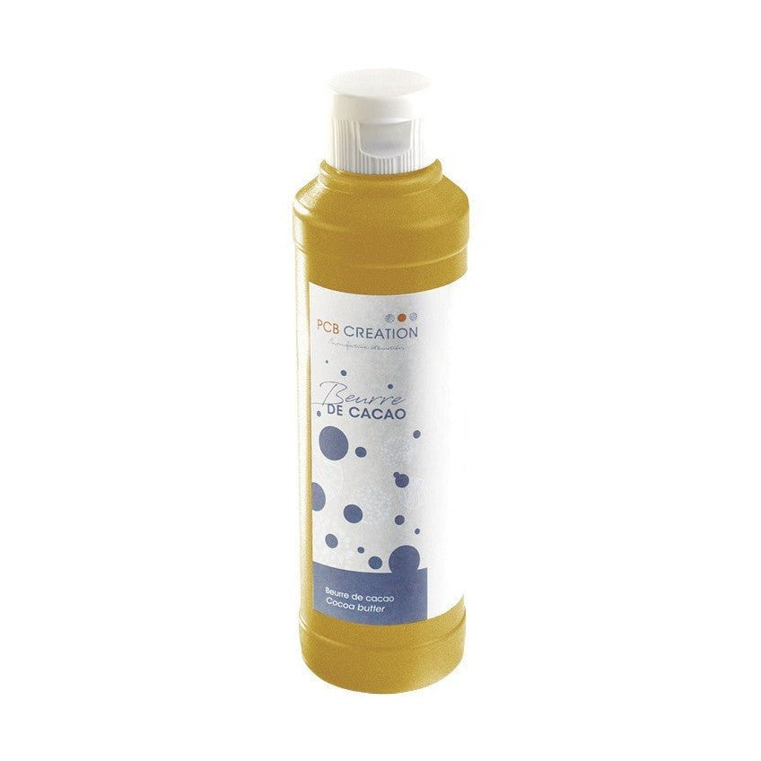 PCB Creation shiny gold cocoa butter in translucent bottle with white ribbed cap and blue polka dot label