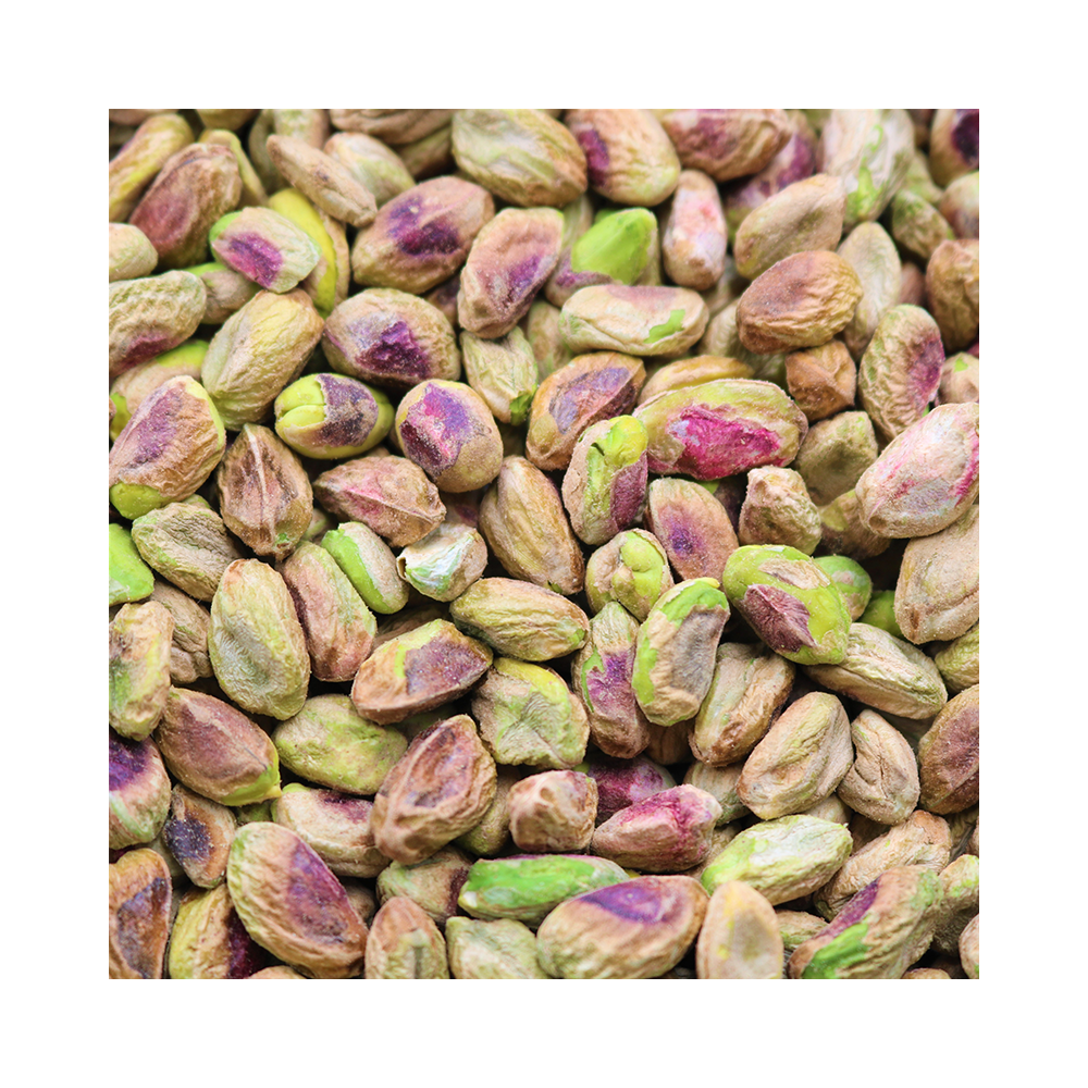 Nut House raw pistachio kernels vibrant green with purple-red blush close-up