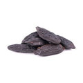 Terre Exotique jet-black wrinkled tonka beans close-up texture