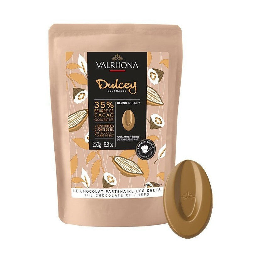 Valrhona Dulcey 35% caramelized butter chocolate with golden-amber glossy disc and biscuity salted flavor