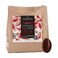 1kg Valrhona Guanaja 70% cocoa dark chocolate matte tan bag with red white botanical label and disc