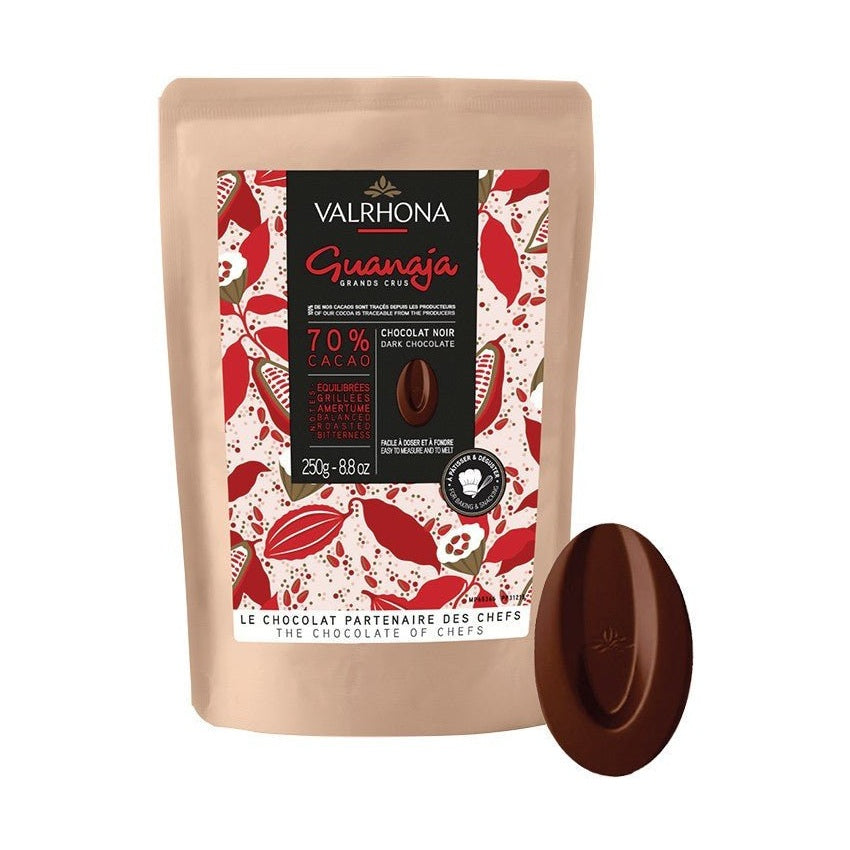 250g Valrhona Guanaja 70% cocoa dark chocolate pouch with embossed logo disc and roasted bitterness label
