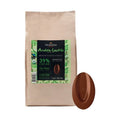 Valrhona Andoa Lactée organic milk chocolate 39% cacao in beige resealable pouch with USDA Organic and Fairtrade labels, shown with smooth brown chocolate disc