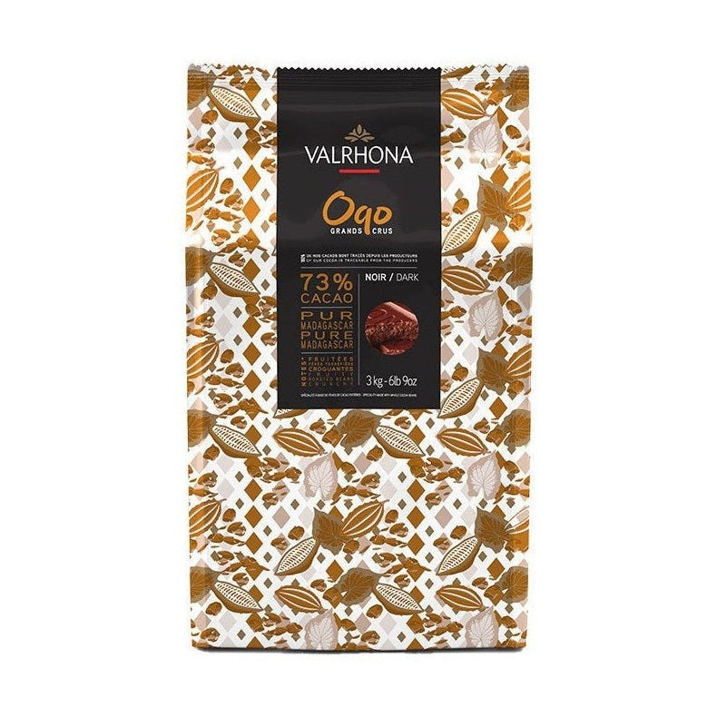 Valrhona Oqo 73% Dark Couverture block with geometric diamond pattern and botanical cocoa illustrations