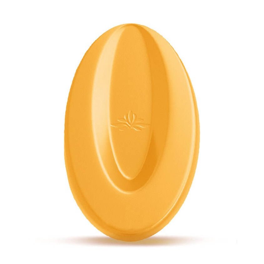 Golden-yellow Valrhona Passionfruit couverture chocolate disc with glossy tempered finish and embossed logo