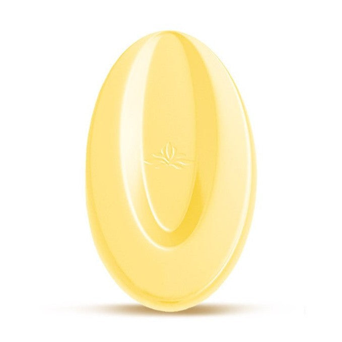 Valrhona Yuzu Inspiration Couverture chocolate disc with glossy pale yellow citrus finish and embossed leaf logo