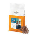 Veliche Belgian Milk Chocolate Dots Inspiration 32% in 5 kg resealable bag with scattered medium-brown chocolate drops