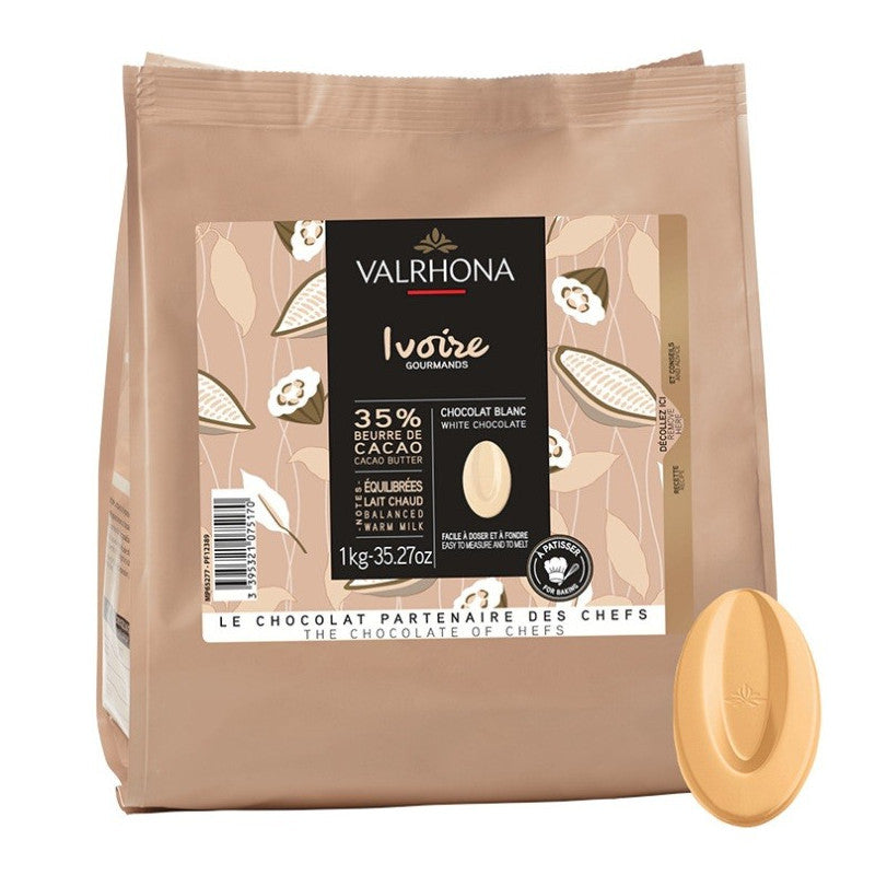 Valrhona chocolate packaging with a piece of white chocolate on a white background